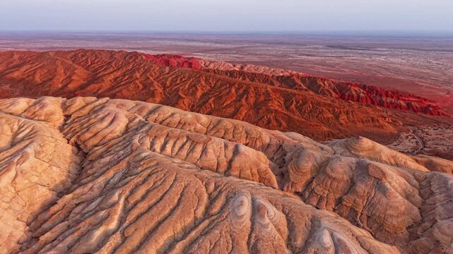 Vivid colorful layered sedimentary mountain with striped geological pattern in Altyn Emel, Kazakhstan