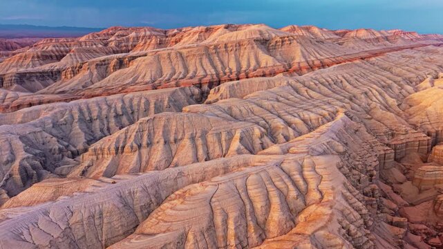 Vivid colorful layered sedimentary mountain with striped geological pattern in Altyn Emel, Kazakhstan