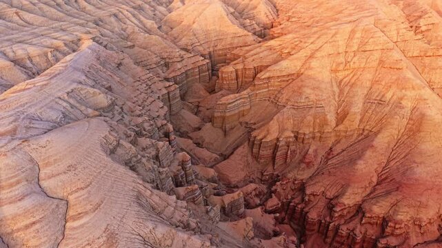 Vivid colorful layered sedimentary mountain with striped geological pattern in Altyn Emel, Kazakhstan