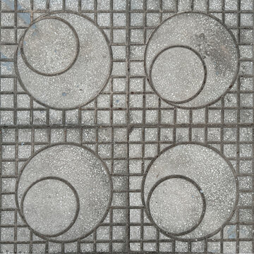 Close up of flat paving stone in retro art deco geometrical frame with checkerboard, mosaic square, circle and round shapes. Good for pavement and sidewalk. Seamless background texture.