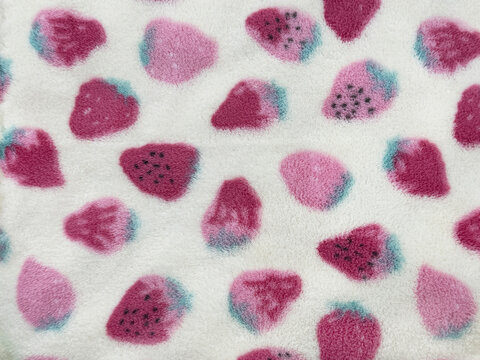 Cute colorful printed art illustration in strawberry fruit shape for kids and children fabric. In red, pink, and white color. Suitable for blanket, upholstery, clothes. Seamless background texture.