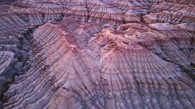 Vivid colorful layered sedimentary mountain with striped geological pattern in Altyn Emel, Kazakhstan