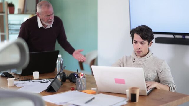 Senior male manager is dissatisfied with the work of an employee - yells and reproaches her. High quality 4k footage