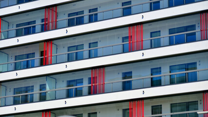 Fototapeta premium Downtown modern residential architecture. Architectural details of modern apartment building. Modern european residential apartment building complex.