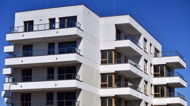 Downtown modern residential architecture. Architectural details of modern apartment building. Modern european residential apartment building complex.