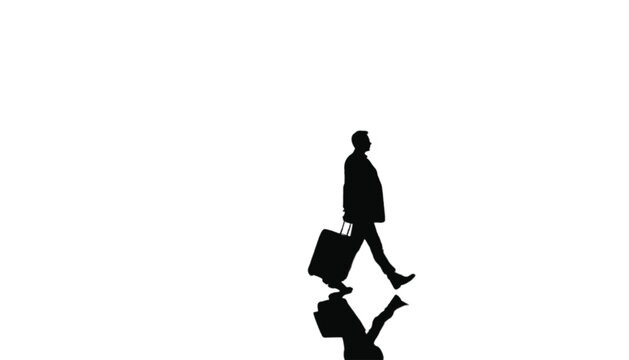 Businessman walks across a bright floor while pulling a rolling suitcase during a business travel trip.
