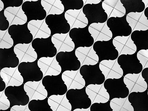 Colonial heritage patterned tiles in random geometrical papilon quatrefoil pattern. Handmade colonial tiles, or old heritage tiles in various colorful paint colors. Seamless texture.