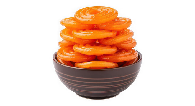 Stack of traditional indian sweet jalebi in a brown bowl, isolated on transparent background