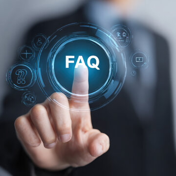 Businessman clicking faq button on digital platform for information and support services