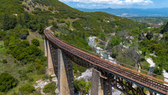 Aerial view of the historic Gorgopotamos railway viaduct over the river in central Greece
