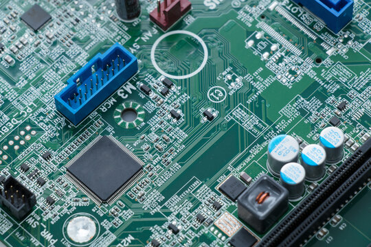 Close-Up of Computer Motherboard with Microchip and Electronic Circuit Components