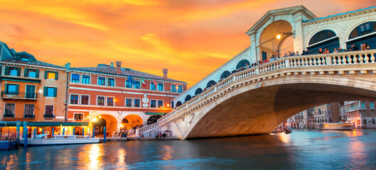 Bright charming landscape with  Rialto Bridge at sunset in Venice, Italy, Europe © anko_ter