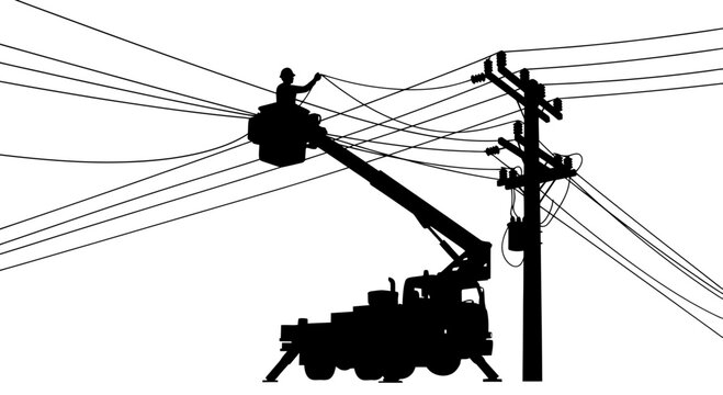 Lineman Silhouette Working on Power Lines in Bucket Truck