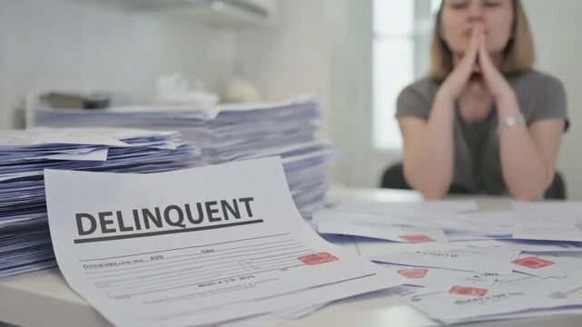 Delinquent person with many bills at home.