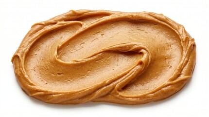Fototapeta premium Creamy peanut butter swirl isolated on white background macro view