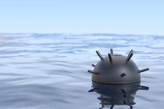 Moored naval mine floating in wavy water