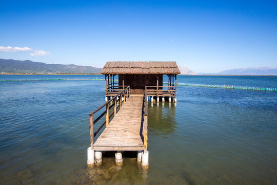 Traditional wooden stilt houses on a pier in Messolonghi lagoon, Tourlida, Greece