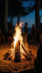 Obraz premium Large campfire burning on a sandy beach at night with blurred people gathered around the flames for outdoor lifestyle, summer vacation and festival celebration campaigns
