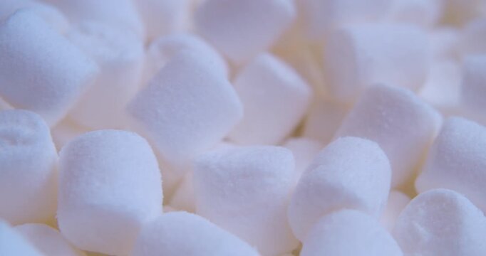 Sweet food background.Small marshmallows close up.