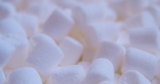 A close-up of  marshmallow pieces.Sweet food. Background