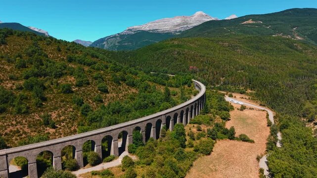 Scenic aerial view of canfranc train viaduct bridge in the pyrenees mountains
