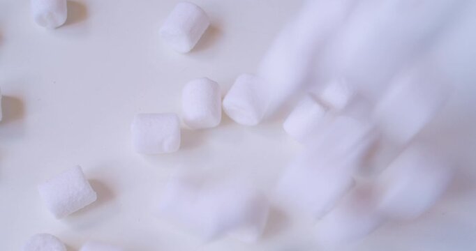 Sweet food background.Small marshmallows close up.
