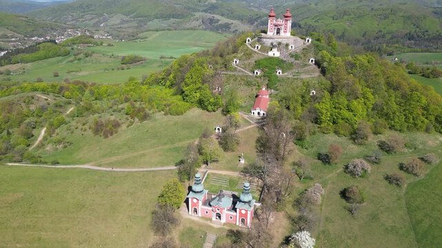 Aerial footage orbiting the Kalvaria complex in Banska Stiavnica. A historic baroque pilgrimage site and UNESCO landmark in Slovakia