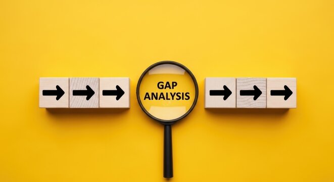 Magnifying glass over gap analysis text on wooden blocks with arrows on yellow background