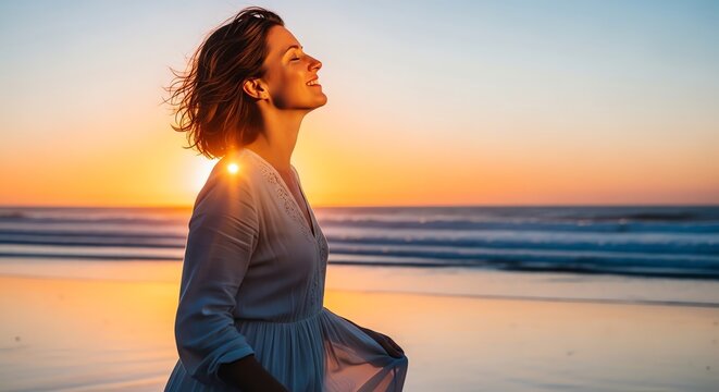 Joyful Woman Embraces Serene Beach Sunset