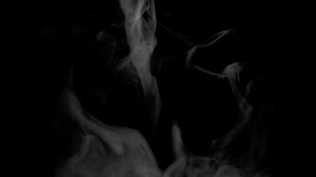 Slow Motion Steam Rising from Boiling Water on Black Background
