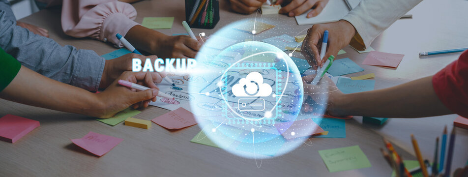 A vibrant office workspace showcasing teamwork and collaborative planning with colorful sticky notes and a digital cloud backup concept highlighting innovation and creativity. Trope