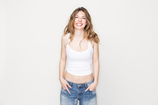 Studio portrait of young woman in studio image.
