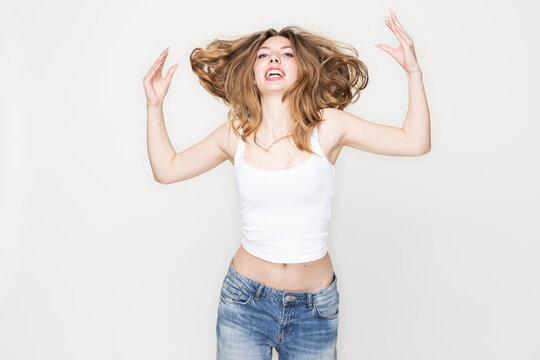 Studio portrait of young woman in studio image.