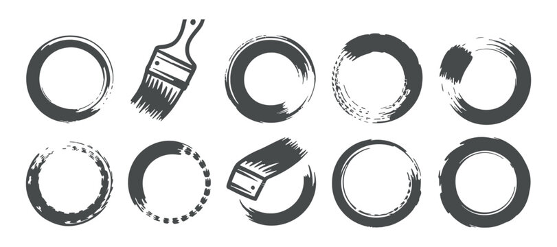 Paintbrush and circular brush stroke silhouettes on a white background