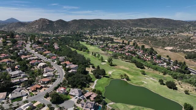 Aerial view of Ramona neighborhood with mountain, valley and San Vicente Golf Course, in California, USA