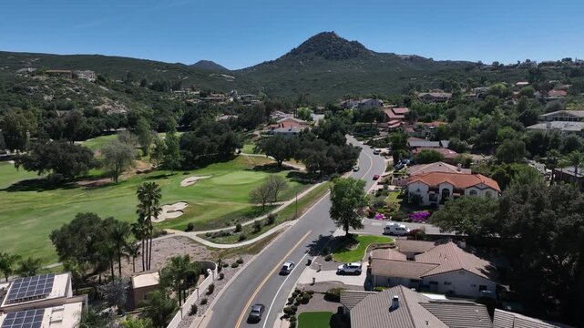 Aerial view of Ramona neighborhood with mountain, valley and San Vicente Golf Course, in California, USA
