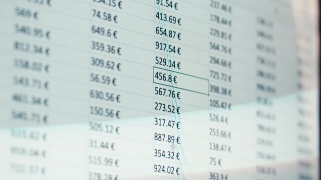 Close-up of financial cash flow data on PC screen. Mortgage payment sheet schedule. Loan fee