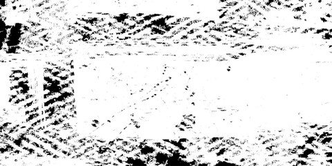 Obraz premium Distressed black and white grunge texture with grainy stipple effect and high contrast ink spatter details for vintage poster design, gritty overlay, and abstract artistic backgrounds.