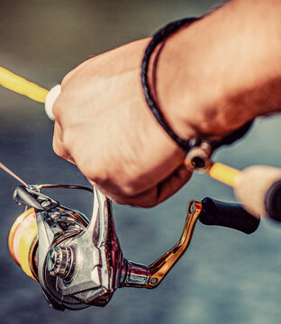 Fishing gear. Fish supplies and equipment. Fishing rod with reel. Fishing Reel. Fishing rod with aluminum body spool