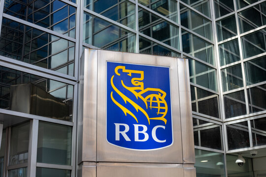 Ottawa, Canada - April 6, 2024: RBC Royal Bank of Canada logo near building in downtown. Corporate banking headquarters in Canada