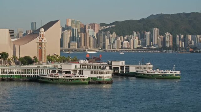 Historic Star Ferry terminal in Victoria Harbor in Hong Kong, China, 4k