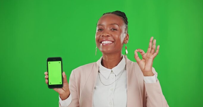 Green screen, okay sign and black woman with phone point for advertising, branding and logo mockup. Happy, studio space and portrait of girl on smartphone for mobile app, website and social media