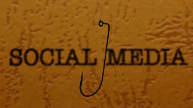Phishing Concept with Fish Hook Over Social Media Background