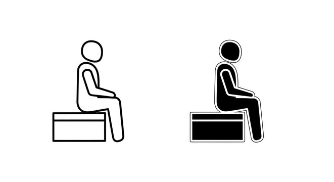 Black and white of two people sitting on chairs with laptops