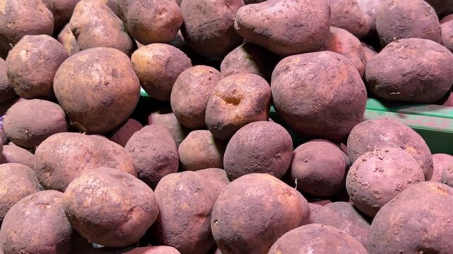 red potatoes on the table sold in the supermarket