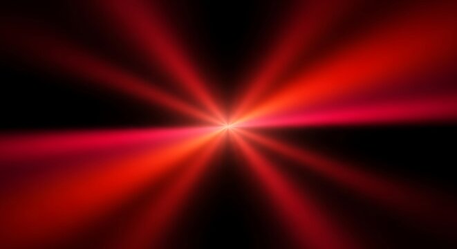 Abstract defocused red light beam explosion on black background