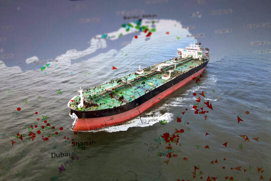 Oil tanker navigating the Strait of Hormuz with maritime traffic overlay