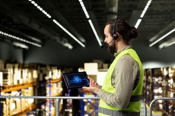Logistics employee, headset and tablet, AI systems, customer service operations, working in...