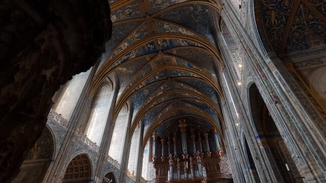 gothic cathedral vaulted ceiling ornate painted ribs pipe organ nave Albi France historic landmark