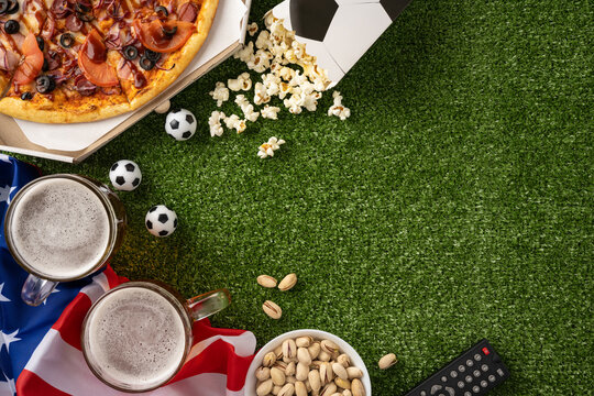 Football championship watch party with pizza beer snacks and USA flag on turf